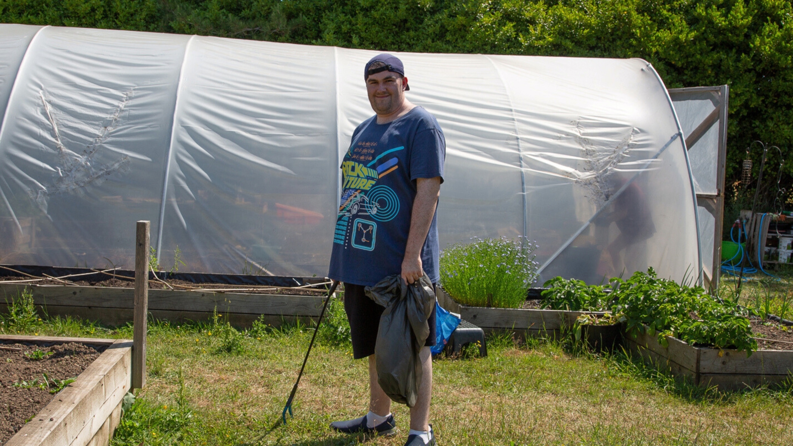 Young person happy working in kitchen 